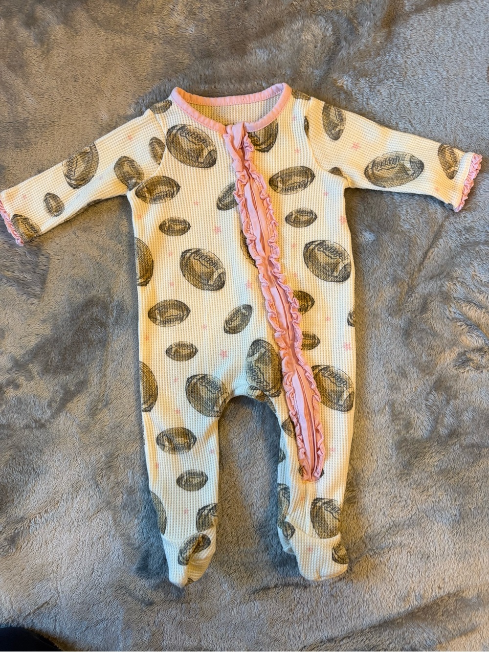 MudPie Baby Pink Trim Footed One-Piece with Neutral Print
